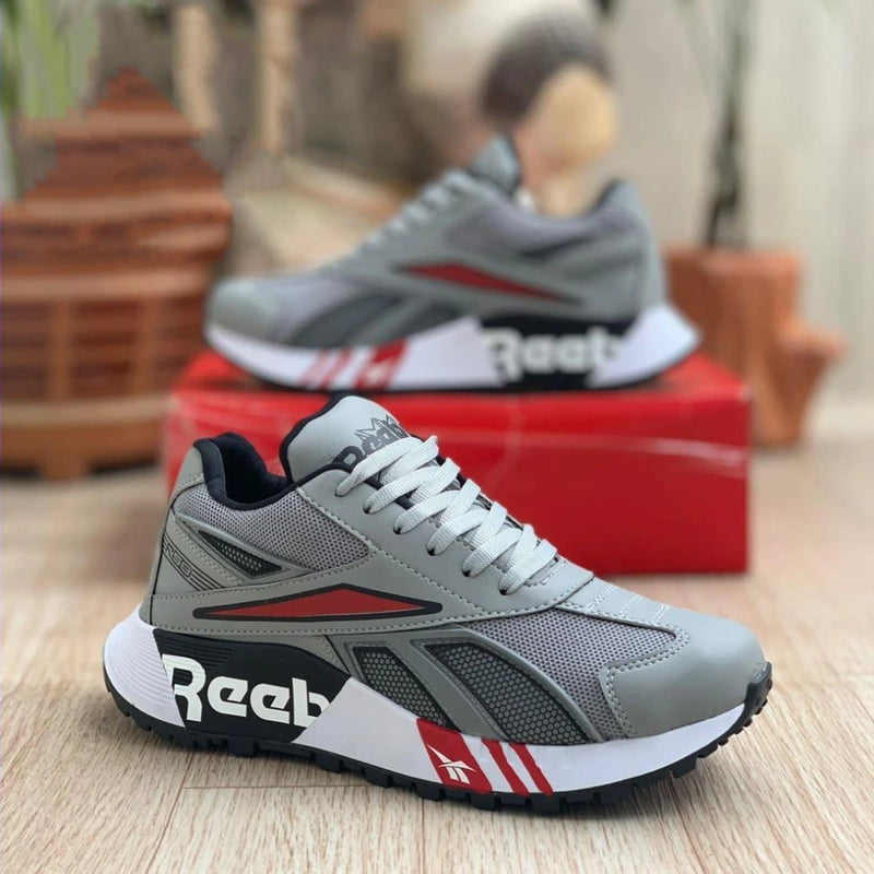 Zapatillas Reebok Caballero con Detalles en Cuero Vegano