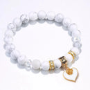 Pulsera de Cerámica Blanca con Detalles de Cristal y Aleación Triple