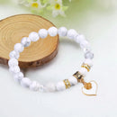 Pulsera de Cerámica Blanca con Detalles de Cristal y Aleación Triple