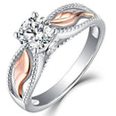 Anillo Alas de Ángel con Piedra de Topacio Blanco