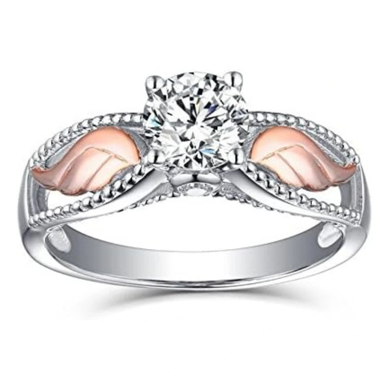 Anillo Alas de Ángel con Piedra de Topacio Blanco