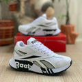 Zapatillas Reebok Caballero con Detalles en Cuero Vegano