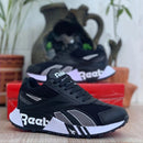 Zapatillas Reebok Caballero con Detalles en Cuero Vegano