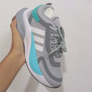 Adidas Bounce Gris Turquesa para Dama: Comodidad y Estilo